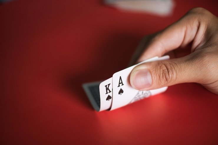 Antarmuka mobile bigobet dengan pilihan meja Relax Gaming dan kontrol taruhan